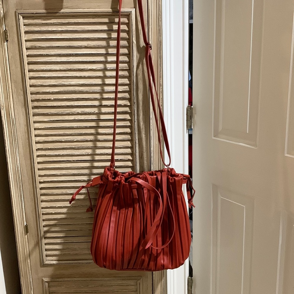 Red Faux leather crossbody purse with shorter handles too